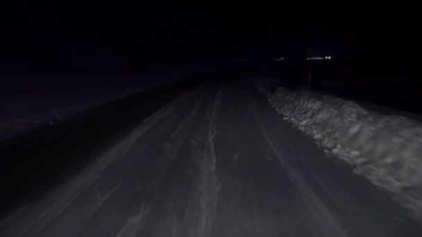Winter road with snow. First person point of view looking through drivers windshield. — Stock Video