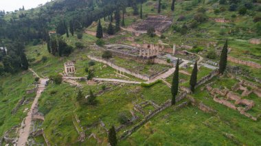 Aerial view of archaeological site of ancient Delphi, site of temple of Apollo and the Oracle, Greece clipart