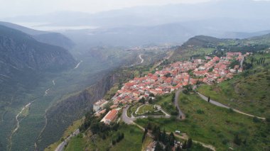 Aerial view of modern Delphi town, near archaeological site of ancient Delphi clipart