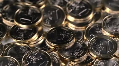 bir euro sikkelerin dönen arka plan