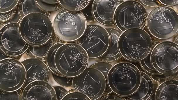 Roterende achtergrond van één euro-muntstukken — Stockvideo