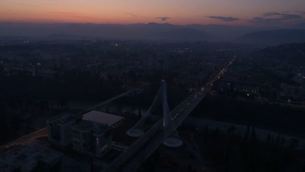 Aerial view of Millennium bridge over Moraca river in Podgorica — Stock Video