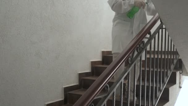 Woman using wet wipe and alcohol sanitizer spray disinfects railing. Disinfection, cleanliness and health care, Anti Coronavirus COVID-19 — Stock Video