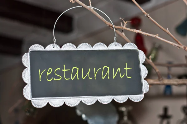 Alerts and ads on a small blackboard: restaurant — Stock Photo, Image