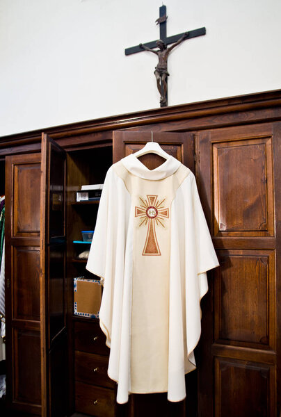 in the sacristy the cassock ready for Holy Mass