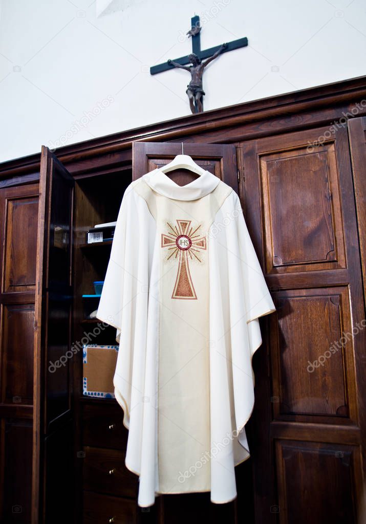 in the sacristy the cassock ready for Holy Mass