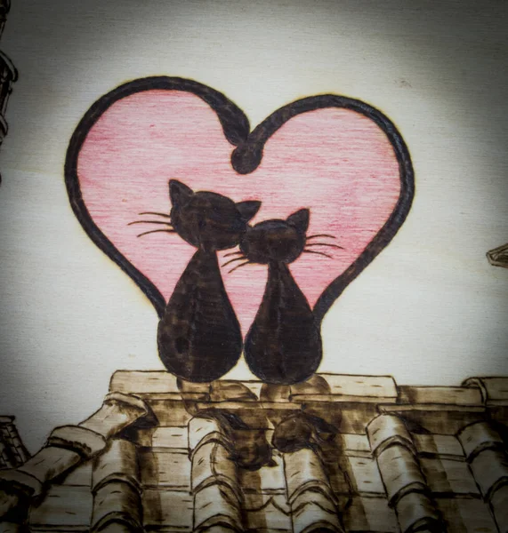 Η αρχαία τέχνη της πυρογραφίας, γάτες και καρδιές για πάντα — Φωτογραφία Αρχείου