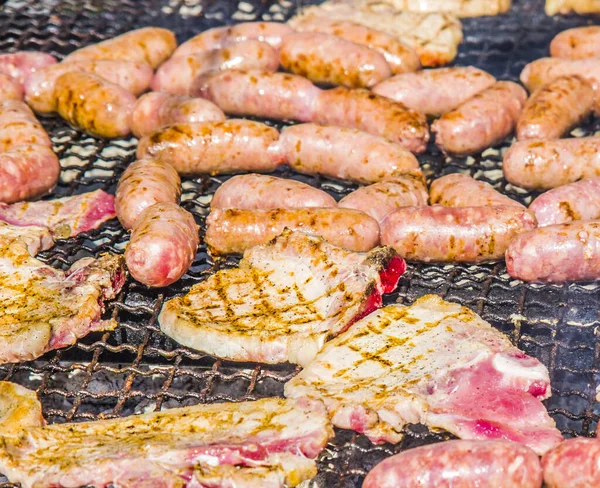 Sausages Pork Steaks Cooked Large Barbaque Hot Coals Aromatic Herbs — Stock Photo, Image