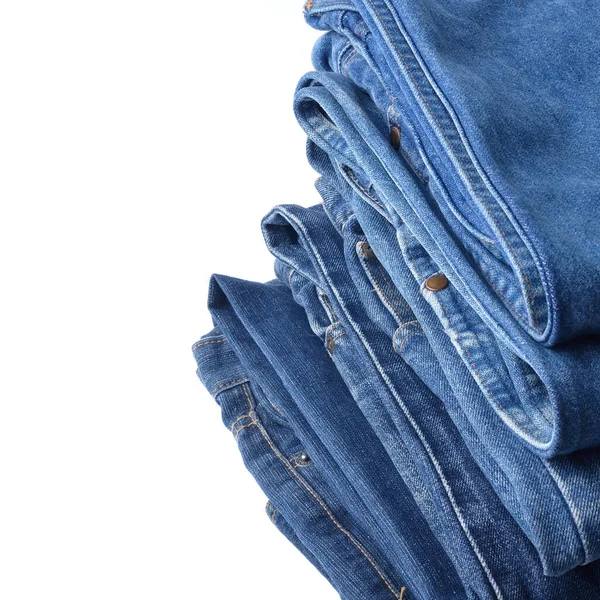 白い背景の上のジーンズ ズボン スタック — ストック写真