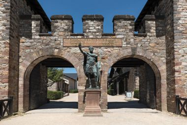 Statue of Antoninus Pius in front of the main gate of the Roman fort Saalburg near Frankfurt, Germany clipart