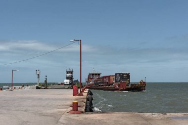 CHIQUILA, MEXICO-MARCH 21, 2018: Ferries from Chiquila to Holbox in the harbor of Chiquila, Quintana Roo, Mexico clipart