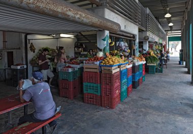 PROGRESO, MEXICO-MARCH 17, 2018: Fruits and vegetable stalls at the local market in Progreso, Yucatan, Mexico clipart