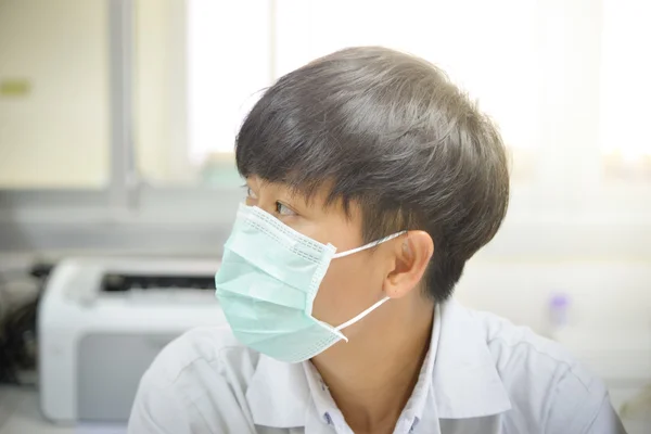 asia scientist working in biological laboratory.