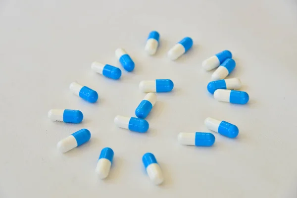 Blue pill on white background. — Stock Photo, Image