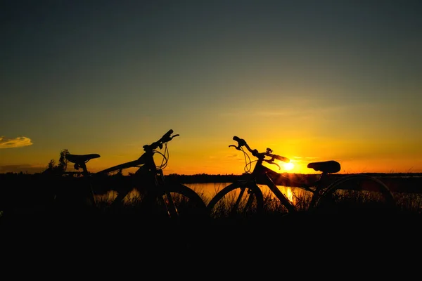 Bike on sunset background. — Stock Photo, Image