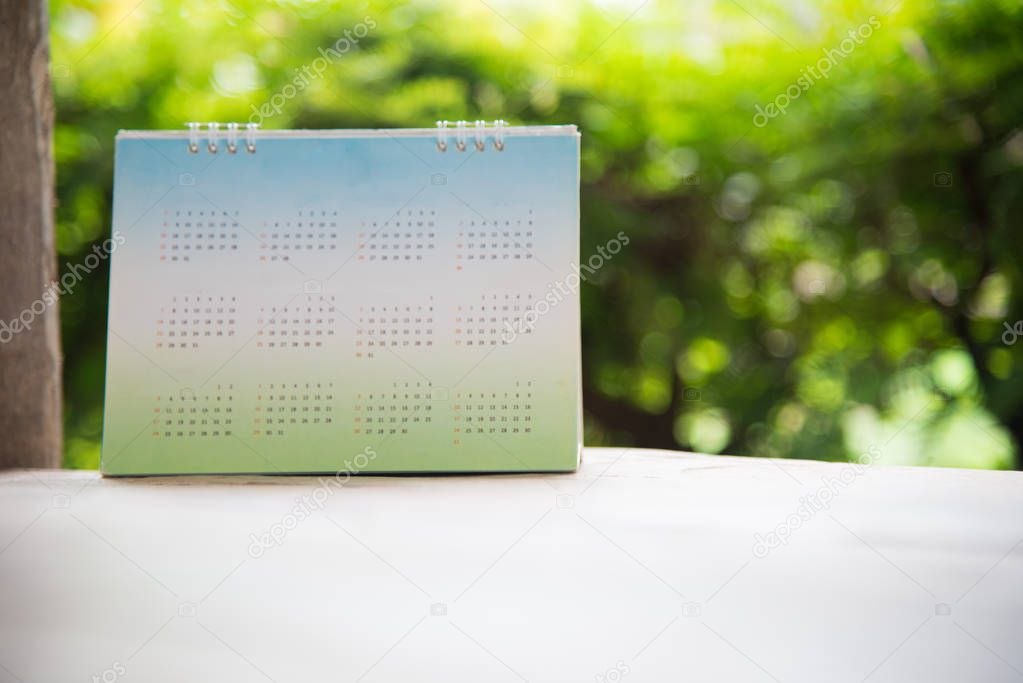 Blurred green calendar