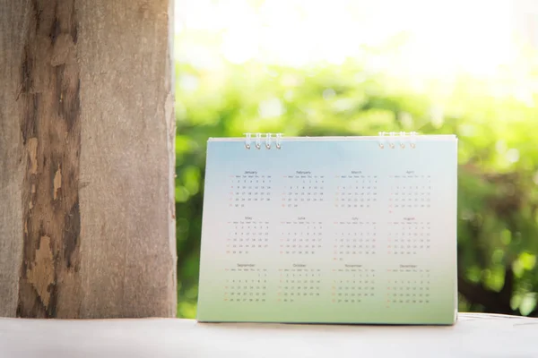 Rozmazané kalendář na zelené — Stock fotografie