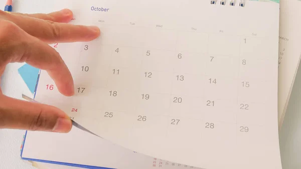 Blurred calendar page on white background.