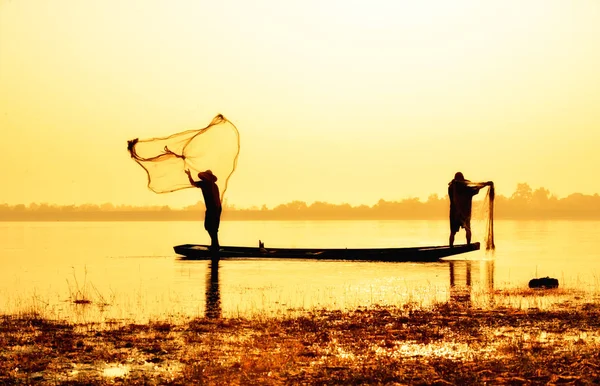 Fisherman on sunset background. — Stock Photo, Image