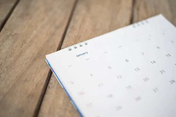 Nahaufnahme Kalender auf Holz Textur. — Stockfoto