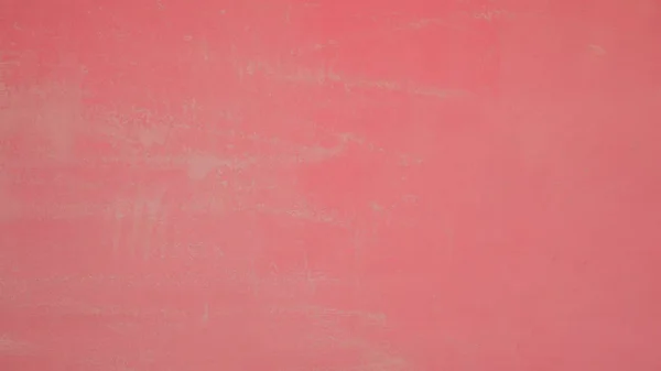 Grunge peach abstract wall background.