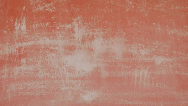 Grunge peach abstract wall background.