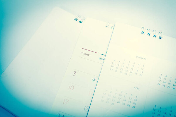 Blurred calendar in planning concept.