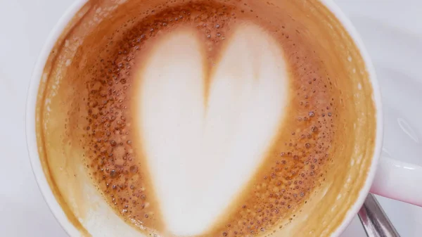 Coffee heart shape in white cup. — Stock Photo, Image