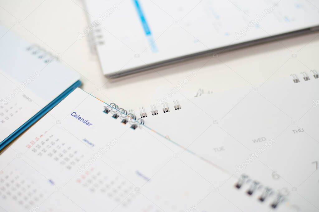 Close up Calendar on white table in planning concept.