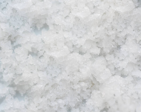 Close up macro white salt background.