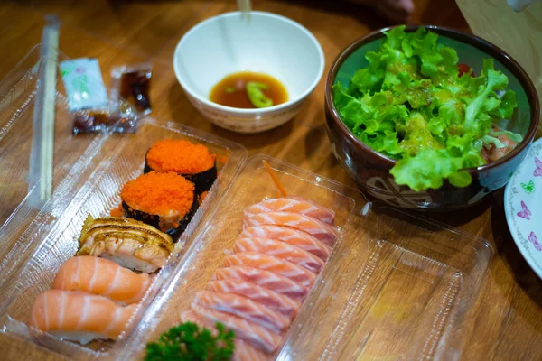 Food deliver sushi in box effect of corona virus.
