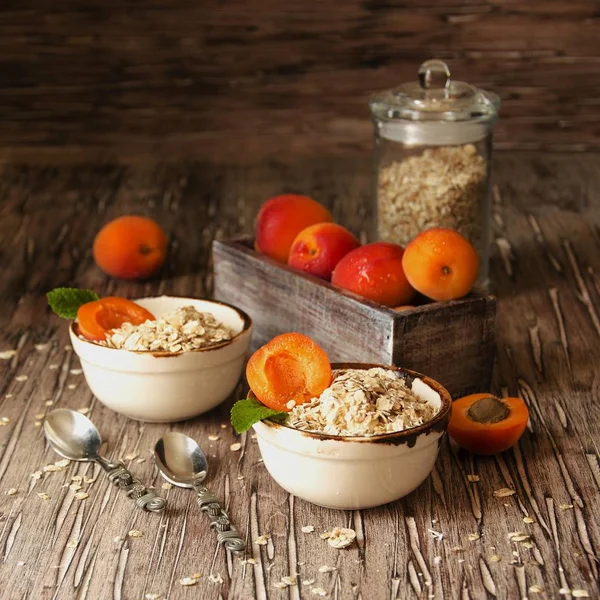 Healthy breakfast of muesli and apricot, selective focus — Stock Photo, Image