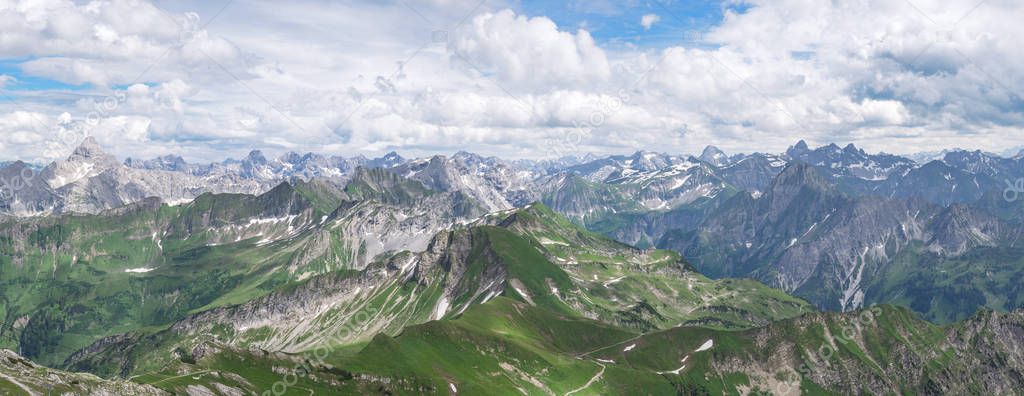 Mountain panorama - view from the peak of Nebelhorn, Germany, in the Allgau Alps. Taken at the end of June with slight snow residues. 