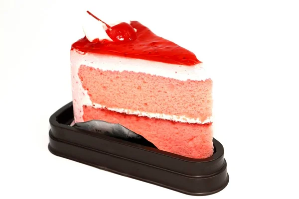 Sweet cherry on strawberry cake — Stock Photo, Image