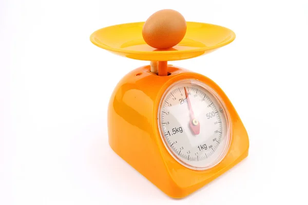 Jajko na wagi — Zdjęcie stockowe
