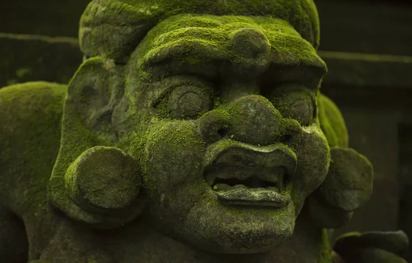 Statues and carvings depicting demons, gods and Balinese mythological deities.