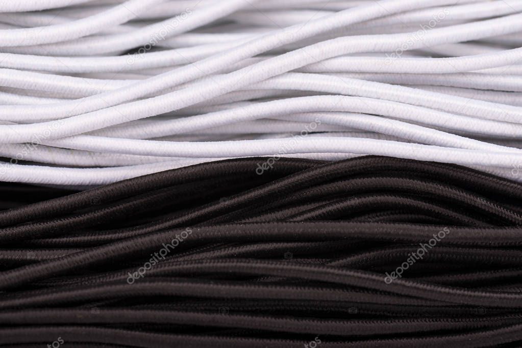 Rubber band for sewing clothes. Sewing elastic band. Elastic for clothing texture background