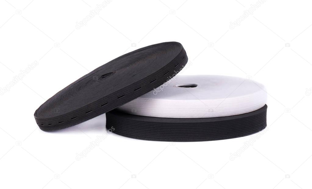 Black and white sewing elastic band isolated on white background. A variety of elastic bands for clothing and furniture.