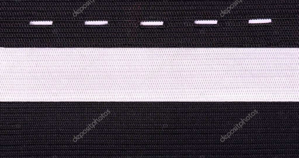 Black and white sewing elastic band isolated on white background. A variety of elastic bands for clothing and furniture.