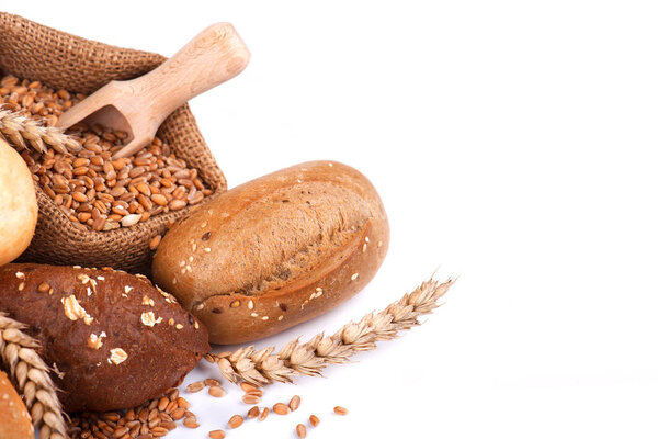 Bread and buns on napkin isolated on white background. Assorted breads isolated on a white background