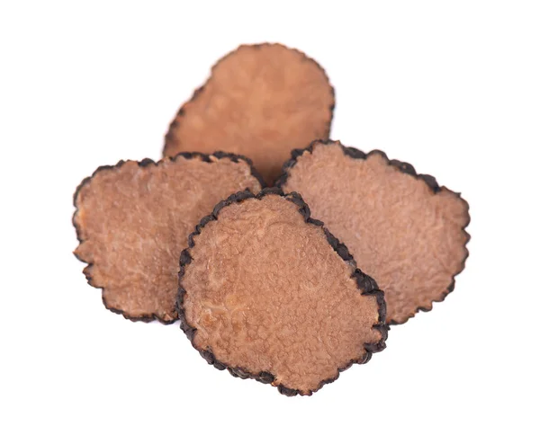 Black truffles isolated on a white background. Fresh sliced truffle. Delicacy exclusive truffle mushroom. Piquant and fragrant French delicacy. Clipping path. — Stock Photo, Image