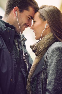 couple listen to music together clipart