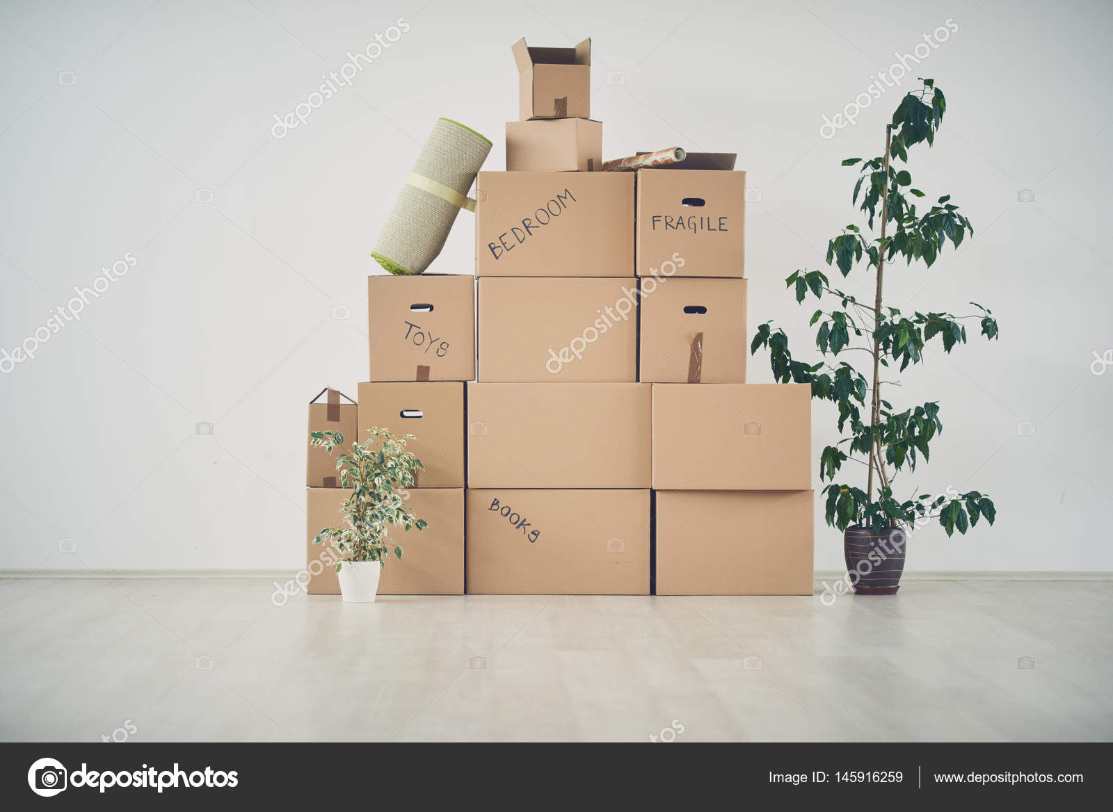 Moving boxes in new apartment — Stock Photo © chika_milan 145916259