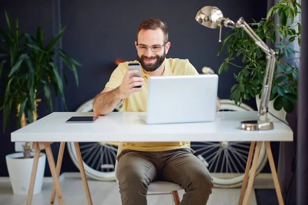 Young man in modern office — Stock Photo, Image