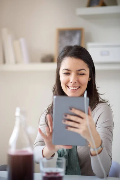 young woman with tablet