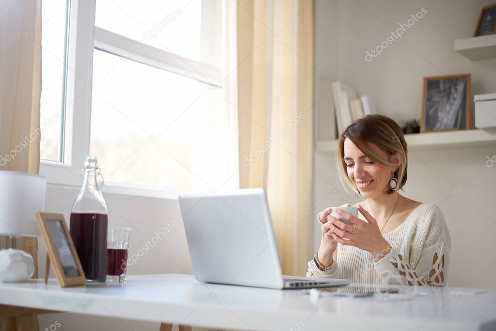 young woman working at home 