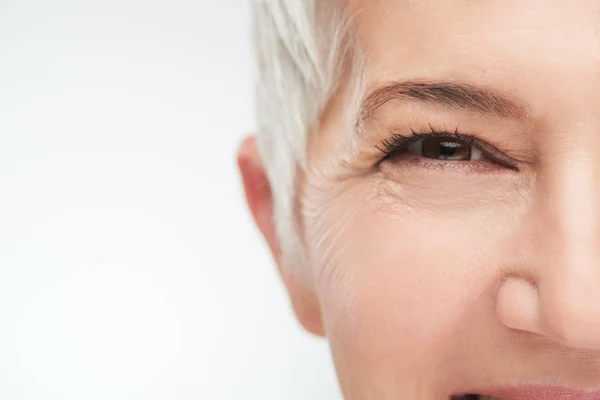 Close up of senir woman eye. — Stock Photo, Image