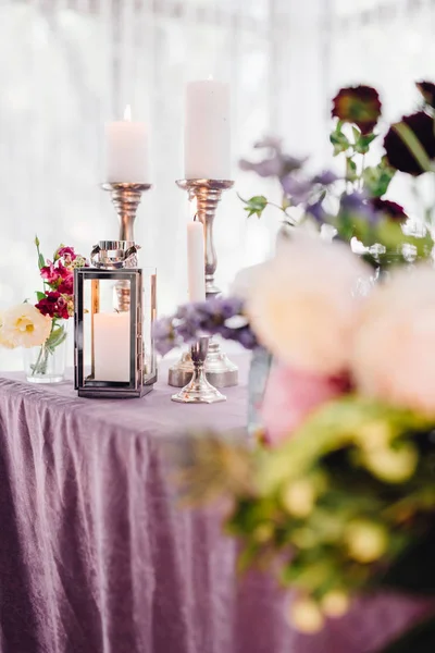 Closeup Candles Flowers Festive Table Violet Cloth — Stock Photo, Image