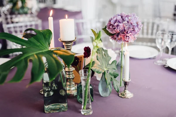 Closeup Candles Flowers Festive Table Violet Cloth — Stock Photo, Image