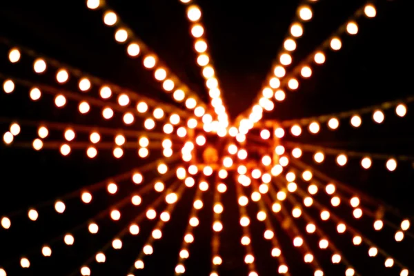 Verschwommene abstrakte Lichter bokeh Hintergrund. Weihnachtsbeleuchtung. — Stockfoto